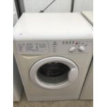 AN INDESIT WIL163 WASHING MACHINE IN WORKING ORDER