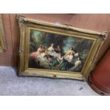 A LARGE GILT FRAMED PRINT OF LADIES IN A FOREST