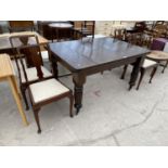 A MAHOGANY DINING TABLE AND FOUR HIGH BACKED MAHOGANY DINING CHAIRS
