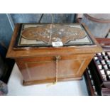 A WALNUT FOLD OUT DESK WRITING SLOPE BOX WITH ORIENTAL MOTHER OF PEARL DESIGN TOP AND INNER BLUE