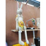 A LARGE WOODEN RABBIT SHELF PUPPET