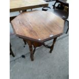 AN OCTAGONAL MAHOGANY SIDE TABLE WITH LOWER SHELF