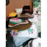 A COLLECTION OF ASSORTED BLANKETS, SHAWLS HATS ETC