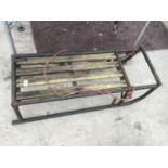 A VINTAGE METAL SLEDGE WITH WOODEN SEAT