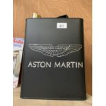 A BLACK METAL ASTON MARTIN OIL CAN