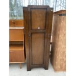 AN OAK SINGLE WARDROBE