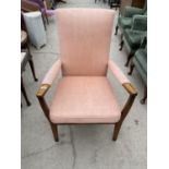 A PARKER KNOLL TEAK ARMCHAIR - MODEL NUMBER PK 964/5/6/7