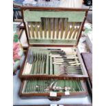 A LARGE VINTAGE OAK CASED CANTEEN OF CUTLERY