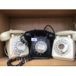 THREE VINTAGE BAKELITE TELEPHONES TWO CREAM ONE BLACK