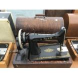 A VINTAGE SINGER SEWING MACHINE WITH CASE