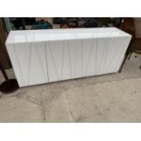 A MODERN WHITE GLOSS SIDEBOARD WITH FOUR DOORS