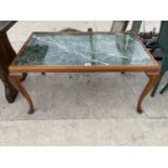 A MAHOGANY COFFEE TABLE ON CABRIOLE SUPPORTS WITH SOLID GREEN MARBLE TOP
