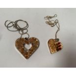 TWO SILVER NECKLACES WITH FLORAL HEART PENDANTS