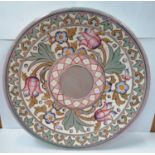 A CHARLOTTE RHEAD CHARGER IN TULIP PATTERN