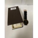 A BOXED DANIEL WELLINGTON GENTS WRIST WATCH