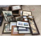 A WOODEN CRATE WITH A COLLECTION OF FRAMED PICTURES