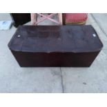 A STUDDED LEATHERETTE OTTOMAN