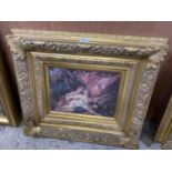 A GILT FRAMED DECORATIVE PRINT