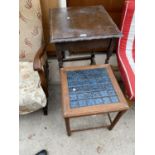 AN OAK SIDE TABLE ON BARLEY TWIST SUPPORTS AND A SMALL TILE TOP SIDE TABLE