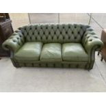 A GREEN LEATHER BUTTON BACK THREE SEATER CHESTERFIELD SOFA