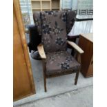 A PARKER KNOLL WING BACK ARMCHAIR - MODEL PK 928/8