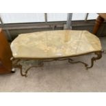 AN ONYX AND BRASS COFFEE TABLE (SOME DAMAGE TO VENEER)