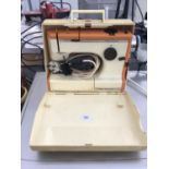 A FRISTER AND ROSSMANN CUB 3 ELECTRIC SEWING MACHINE WITH PEDAL AND CASE IN WORKING ORDER