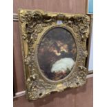 A DECORATIVE GILT FRAMED PRINT