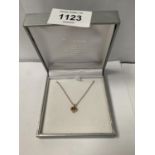 A LADIES BOXED 9CT GOLD NECKLACE WITH HEART PENDANT