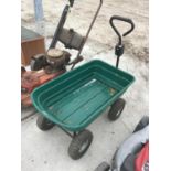 A FOUR WHEELED TROLLEY WITH HANDLE