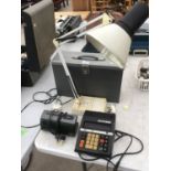 AN ANGLE POISE LAMP, METAL RILE CASE, CALCULATOR AND A CLOCK RADIO IN WORKING ORDER