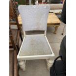 A WHITE DINING CHAIR