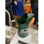 A GREEN METAL PAINTED CASTROL JUG