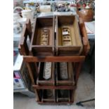 A WOODEN STAND WITH VINTAGE STYLE BRICK MOULDS