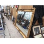 A VERY LARGE ORNATE GILT FRAMED MIRROR 214CM X 154CM