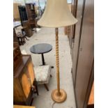 A BEECH STANDARD LAMP WITH BARLEY TWIST COLUMN