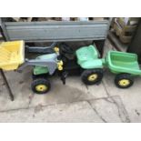 A CHILDS RIDE ON PEDAL TRACTOR WITH FORE END LOADER AND TRAILER