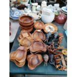 A COLLECTION OF ASSORTED WOODEN ITEMS, SERVING DISHES, ANIMAL FIGURES ETC