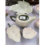 A CARLTON WARE GREEN LEAF PATTERN CERAMIC PART TEA SET, TEAPOT, DISH AND TWO LEAF DISHES
