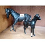TWO BESWICK CERAMIC HORSE MODELS - BLACK BEAUTY AND FOAL