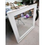 A LARGE WHITE WOODEN FRAMED MIRROR