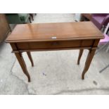 A CHERRY WOOD HALL TABLE ON CABRIOLE SUPPORTS WITH SINGLE DRAWER