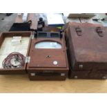 A VINTAGE WOODEN CASED VOLT METER WITH LEATHER CARRY CASE