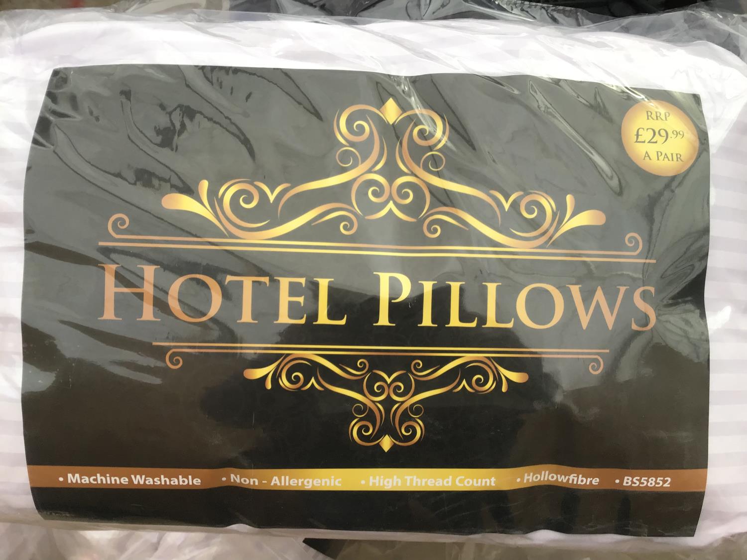 FOUR PACKS OF NEW HOTEL PILLOWS (TWO PILLOWS PER PACK) RRP £29.99 PER PACK