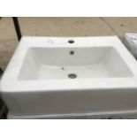 AN AS NEW AND BOXED VICTORIA PLUMB WHITE WASH BASIN 600 X 440 BAS1001