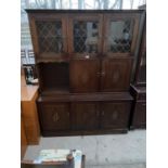 AN OAK CABINET WITH THREE LOWER AND FIVE UPPER DRAWERS