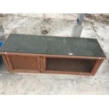 A WOODEN PET HUTCH WITH FELT ROOF, SLEEPING AREA AND LOAFING IN GOOD CONDITION