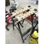 A FOLDING WORK BENCH