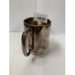 A HALLMARKED SILVER TANKARD