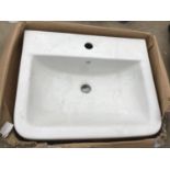 AN AS NEW AND BOXED WHITE VICTORIA PLUMB WASH BASIN 550 BAS1004